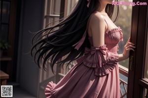 A woman in a pink dress is posing by a window.
